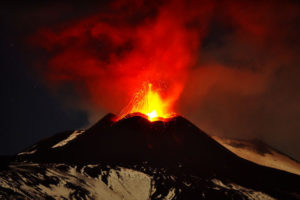 Mt. Etna, Europe's most active volcano, spews lave during an eruption on Nov. 16, 2013. The cold summer of 1816 is attributed to large volcanic eruptions. (Photo credit: Associated Press)